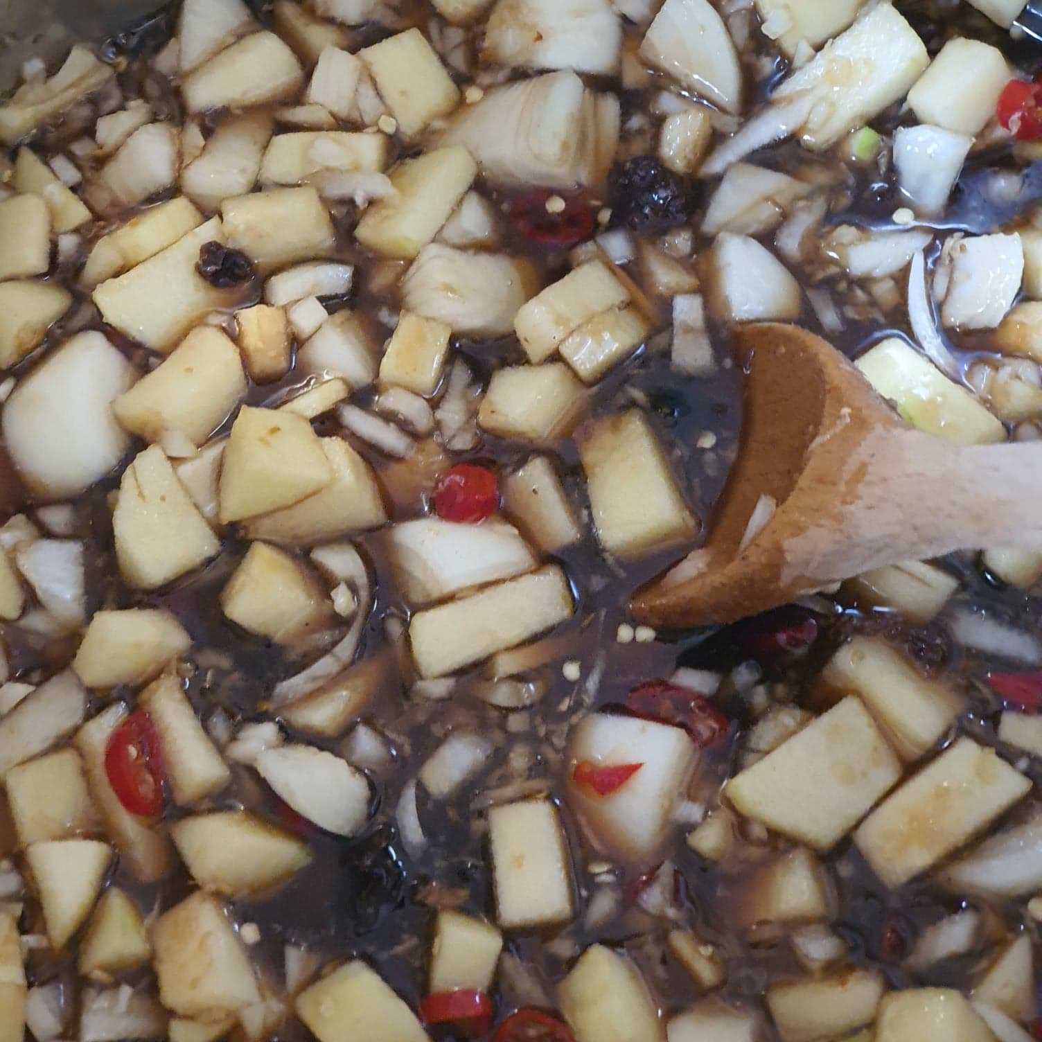 Starting the cooking of the mangoes.